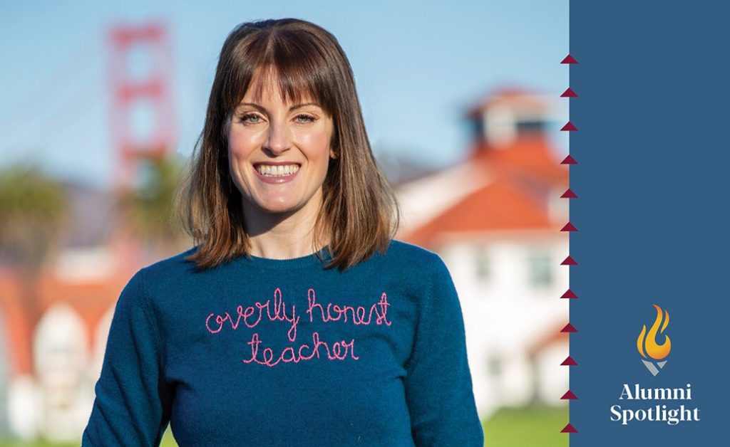 Female wearing a sweatshirt that reads "overly honest teacher" smiling at the camera with an overlay of text "alumni spotlight"